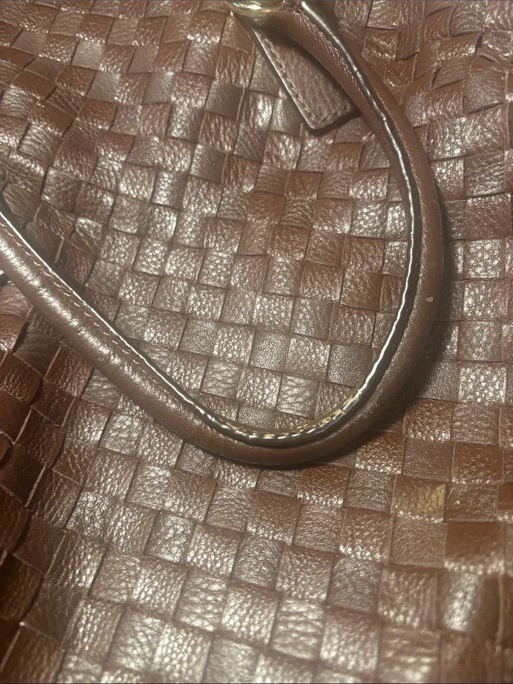 Michael Kors brown leather woven purse with lock and key